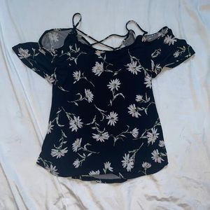 Editing black blouse with flowers
